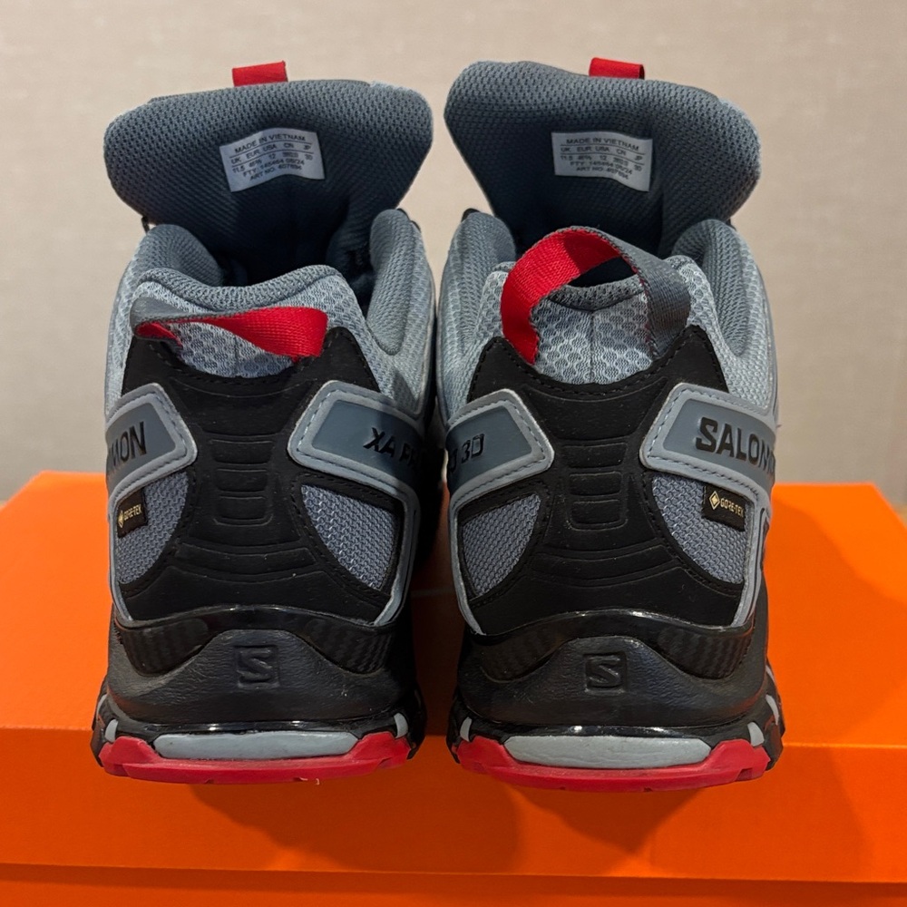 Salomon Grey and Black Trail Sneakers with Red Accents - Picture 4 of 7